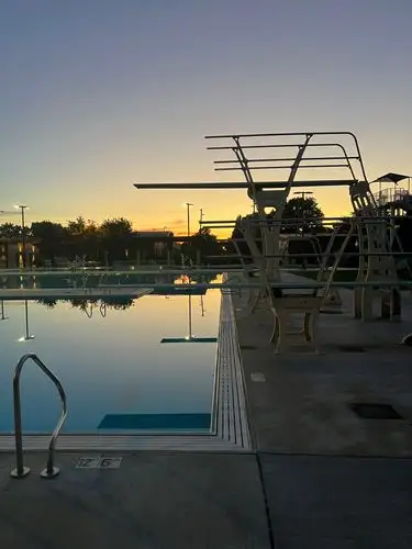 Twilight reflections on the calm pool.
